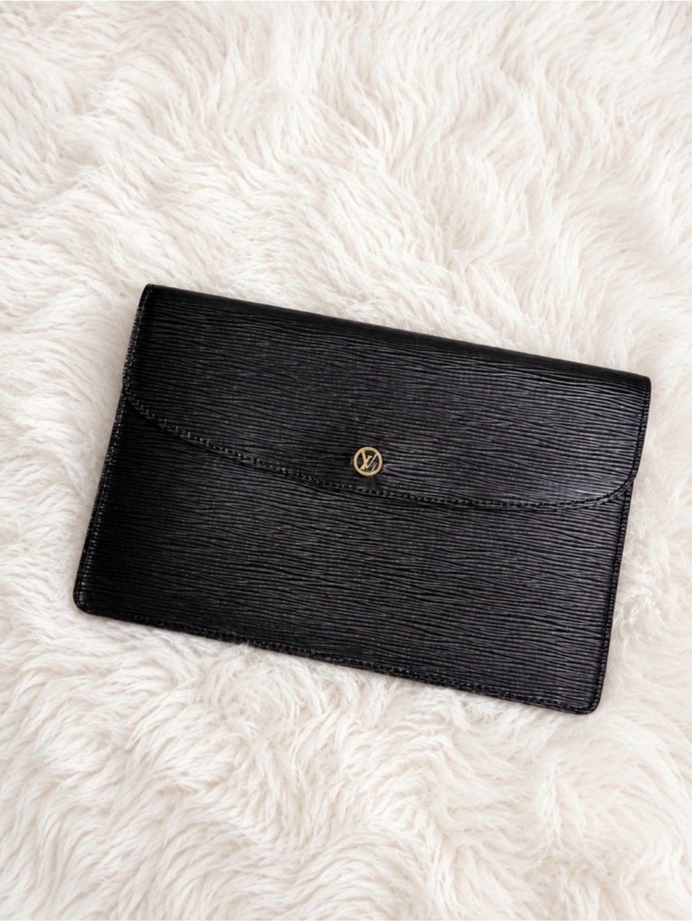 Vintage Louis Vuitton Black Epi Envelope Clutch / Crossbody.
Collectors Item